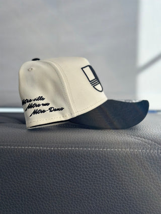 NEW ERA 9FORTY A-FRAME SNAPBACK NOTRE VILLE/NOTRE RUE/NOTRE-DAME "CREAM"