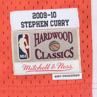 MITCHELL & NESS STEPHEN CURRY GOLDEN STATE WARRIORS 2009-10 ORANGE SWINGMAN JERSEY